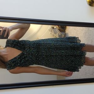 Floral dress with ruffles around collar!  Knee-length, semi-formal